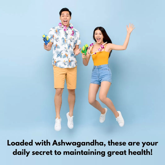 Couple jumping with water guns.| Herb Terra